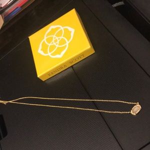 Kendra Scott gold necklace with clear stone